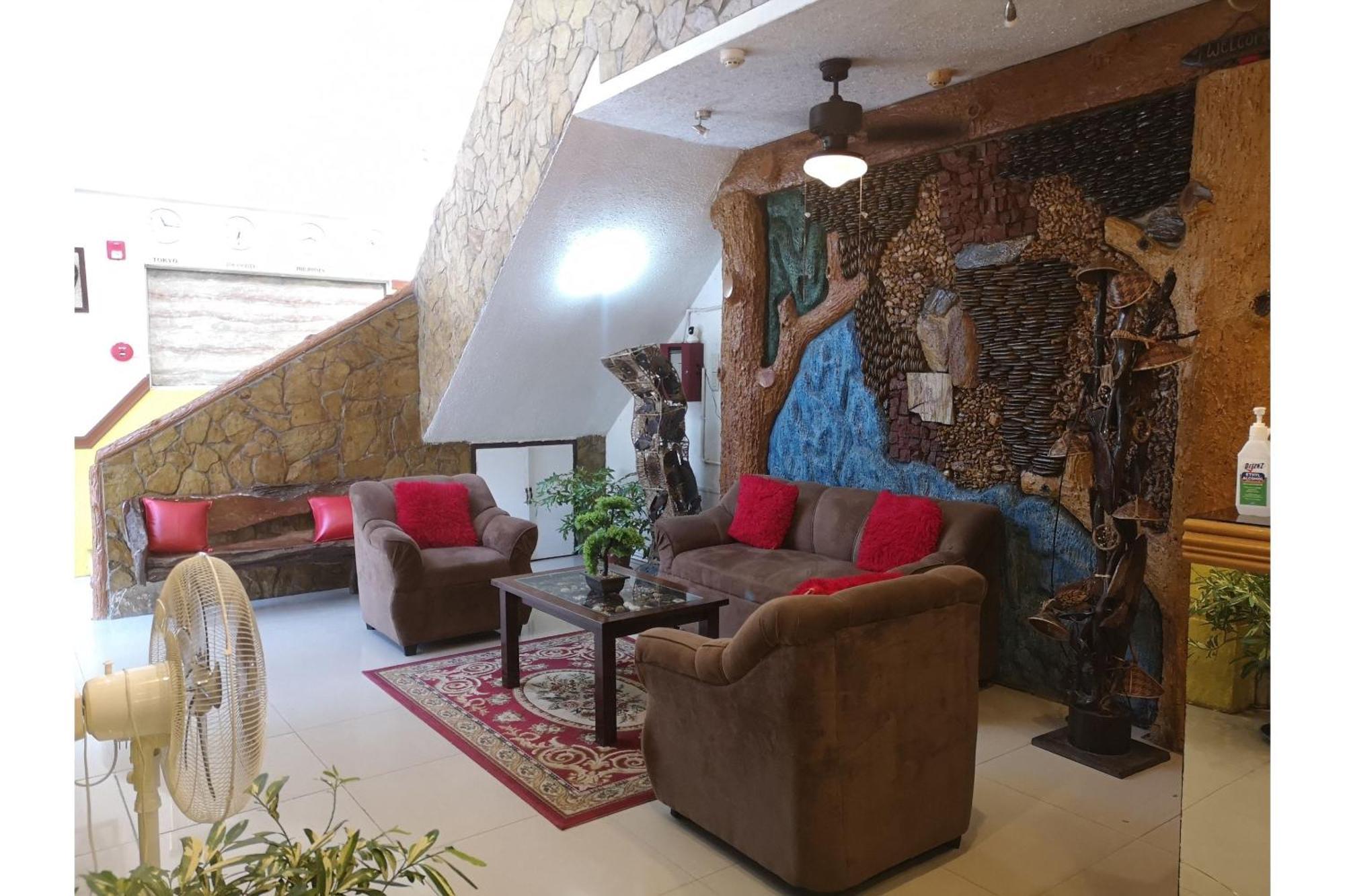 פורטו פרינססה Oyo 880 Flores De Musa Inn מראה חיצוני תמונה